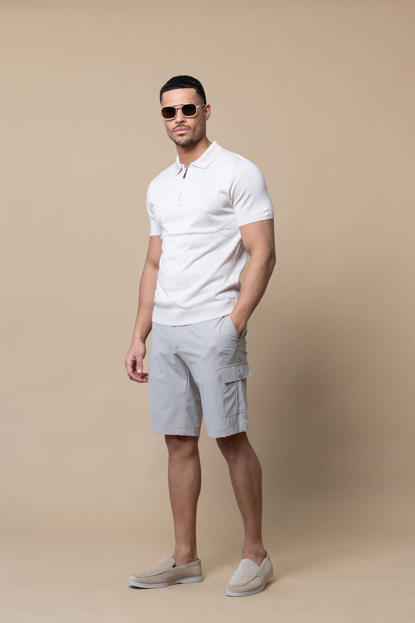HALF-ZIP DE MANGA CORTA
