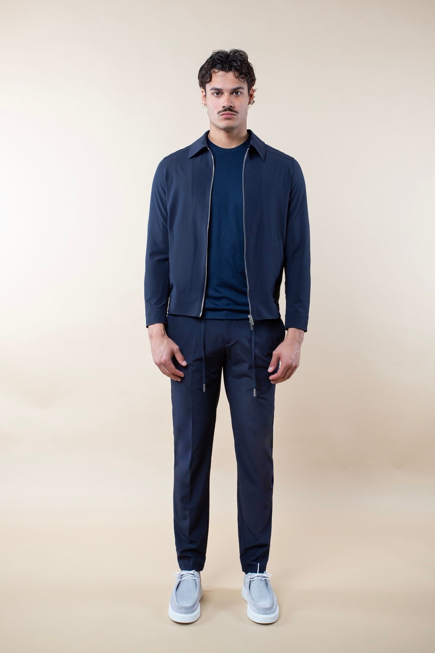 TECH POLO ELÁSTICO SUIT