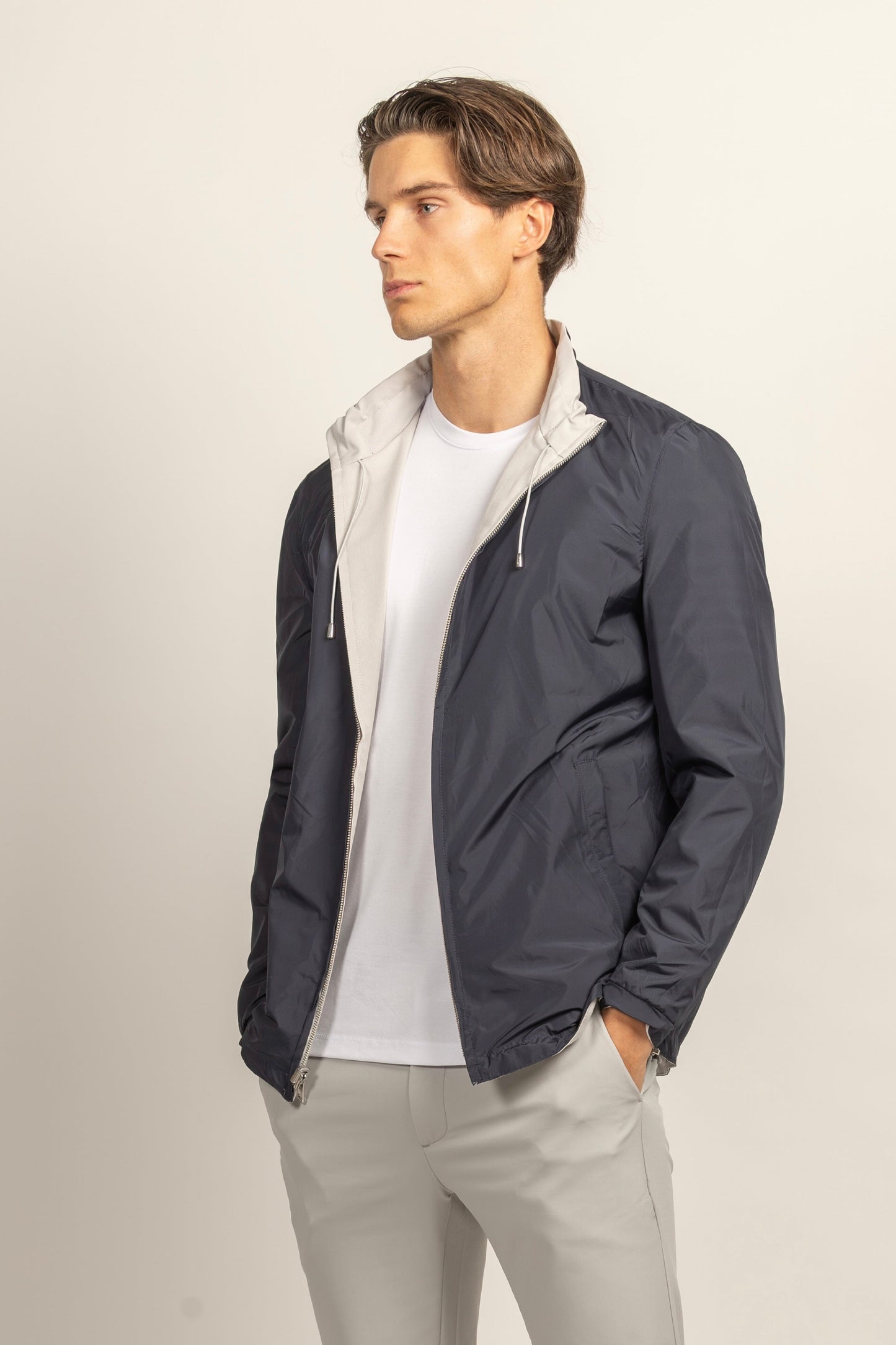 TWEEZIJDIG VARSITY CHAQUETA