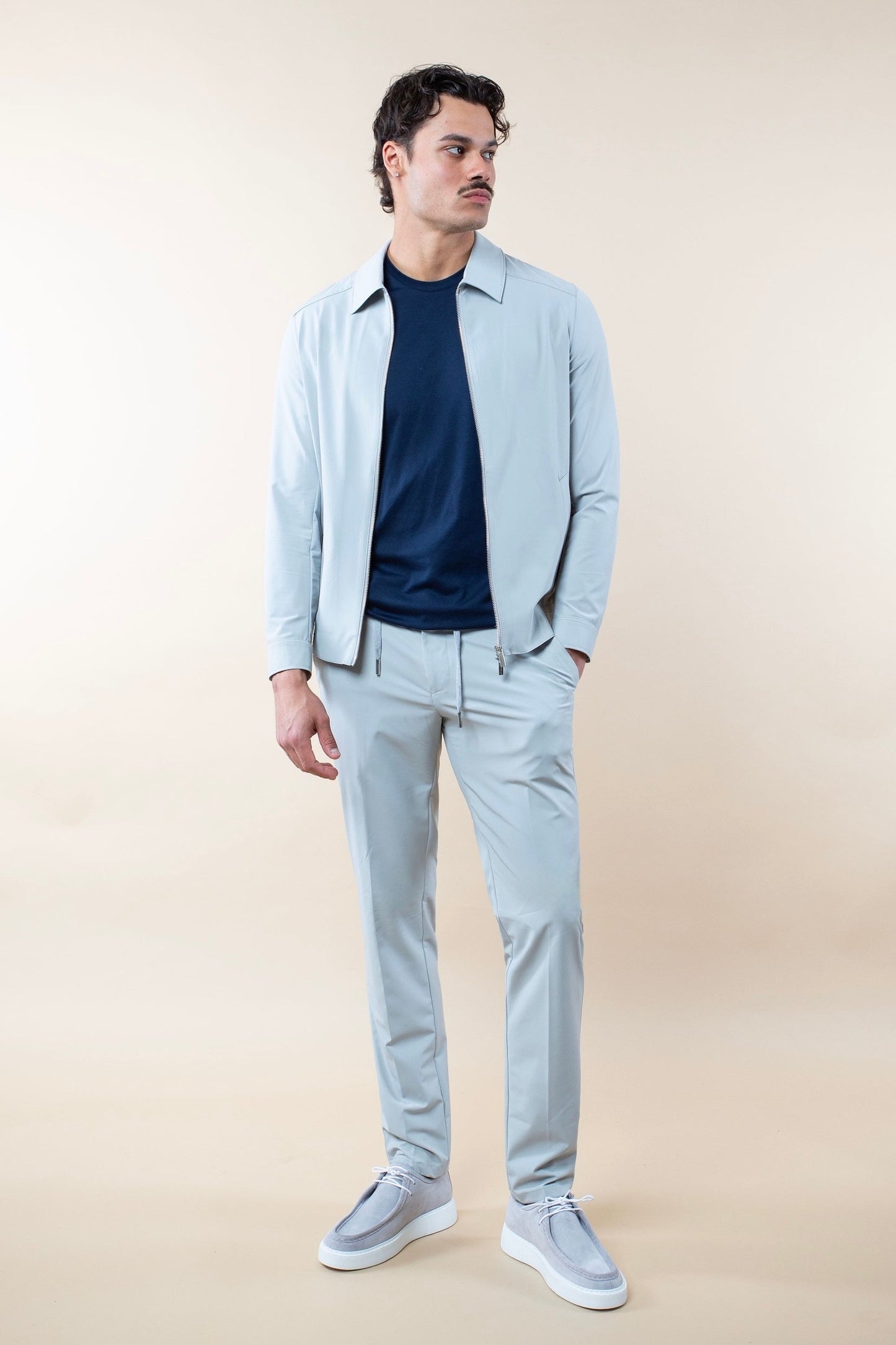 TECH POLO ELÁSTICO SUIT